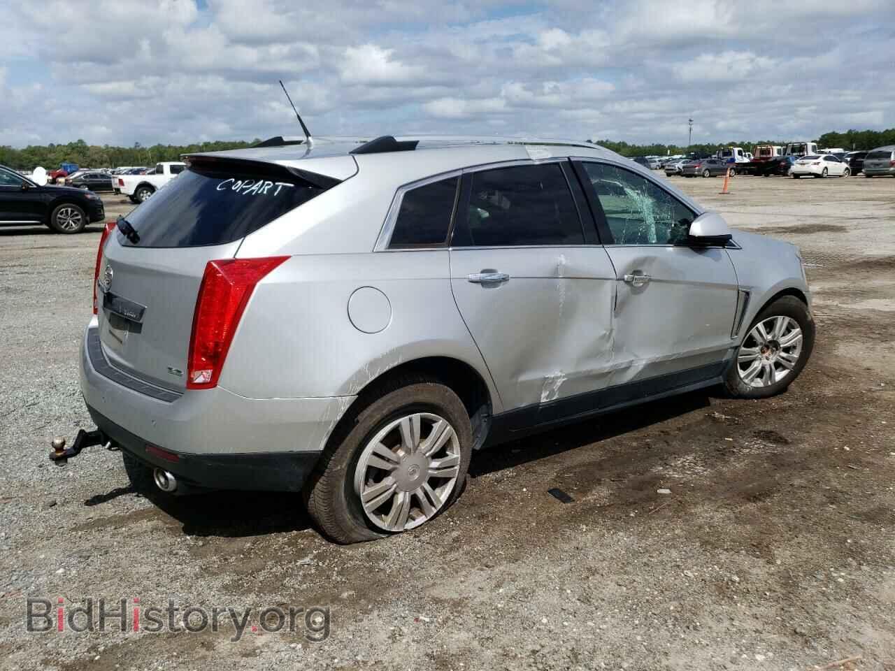 2014 CADILLAC SRX - VIN: 3GYFNEE30ES543760 - Фото 3