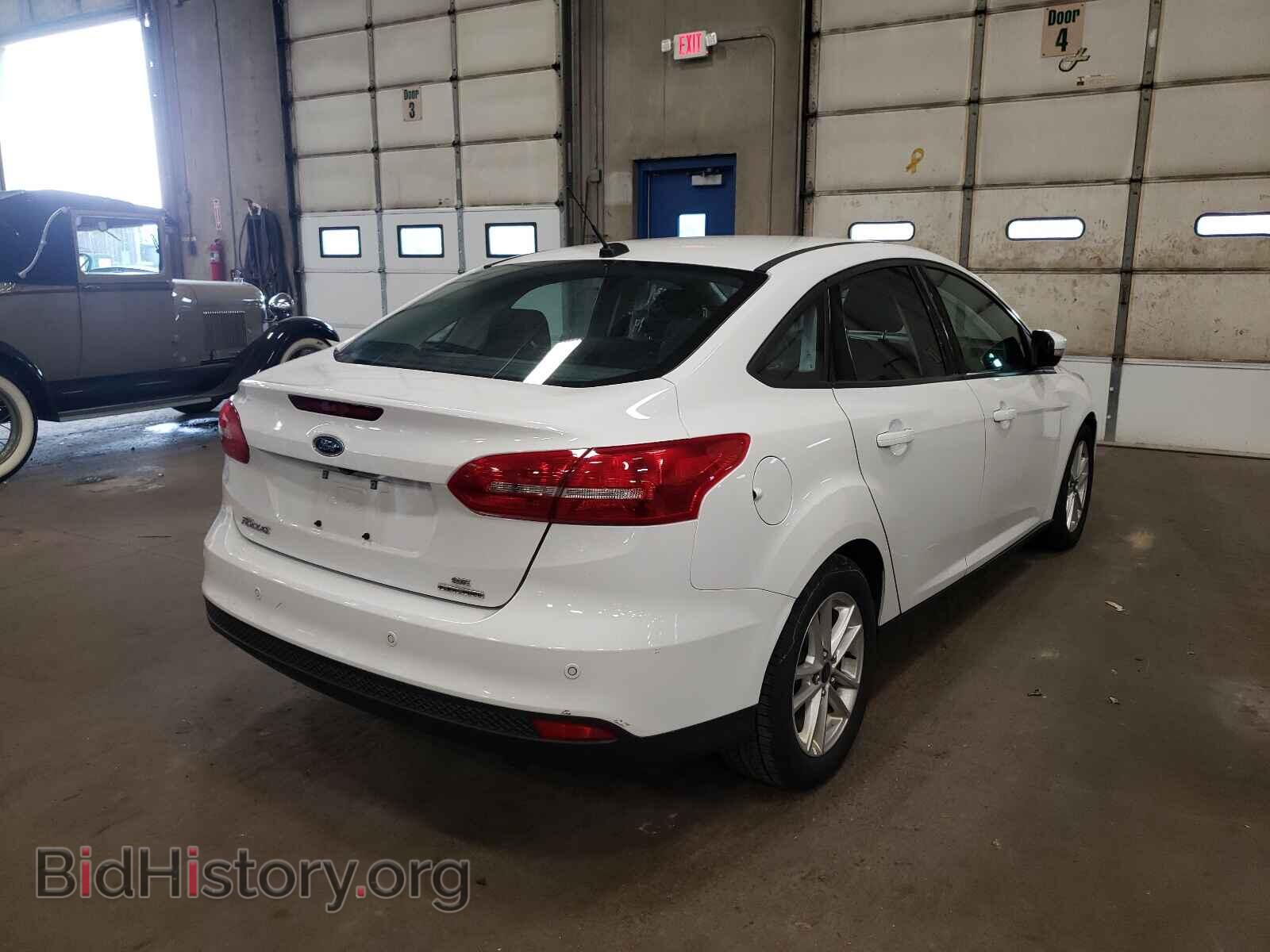 2015 FORD FOCUS - VIN: 1FADP3F27FL348656 - Photo 4