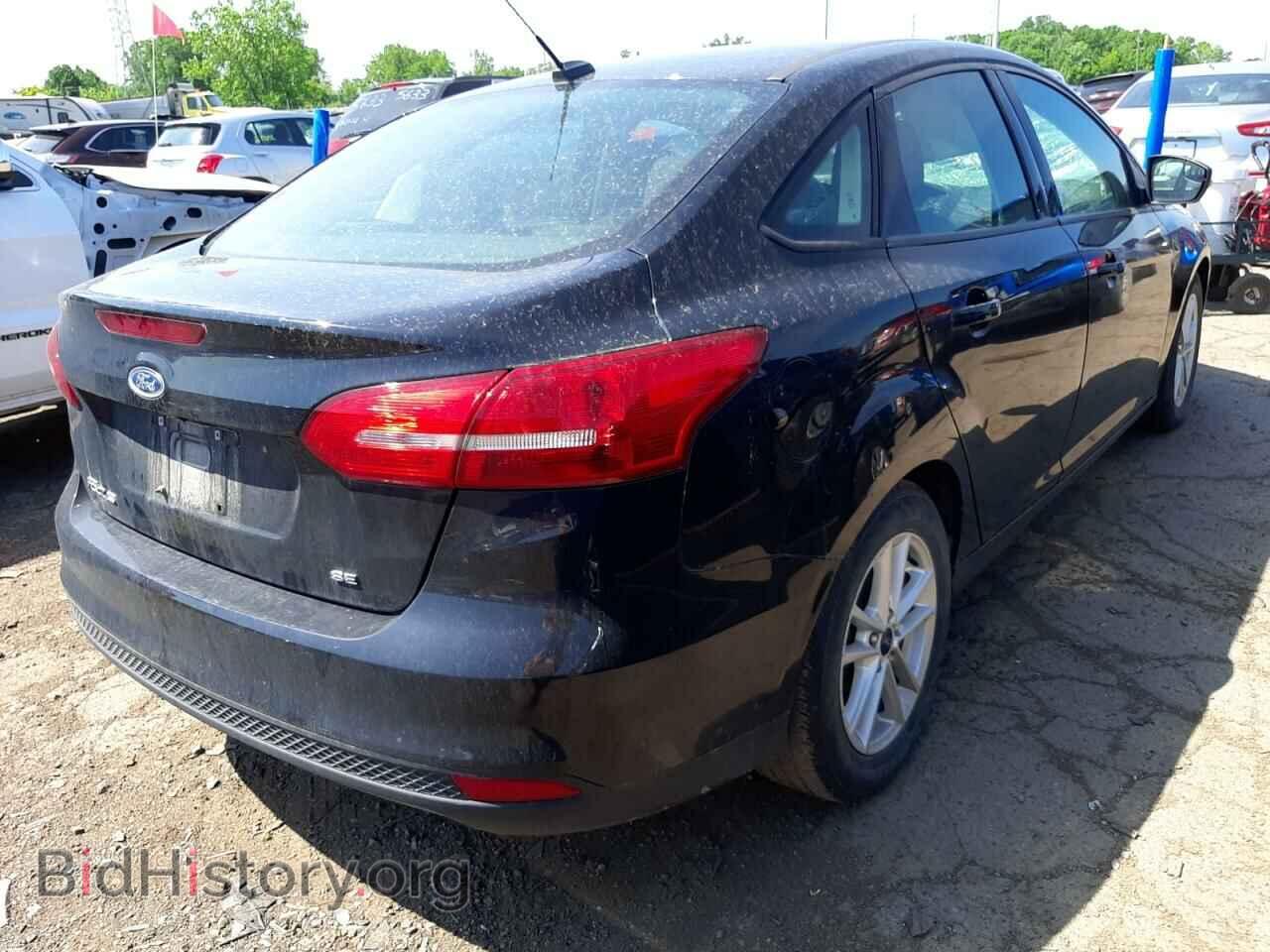 2017 FORD FOCUS - VIN: 1FADP3F21HL209934 - Photo 4