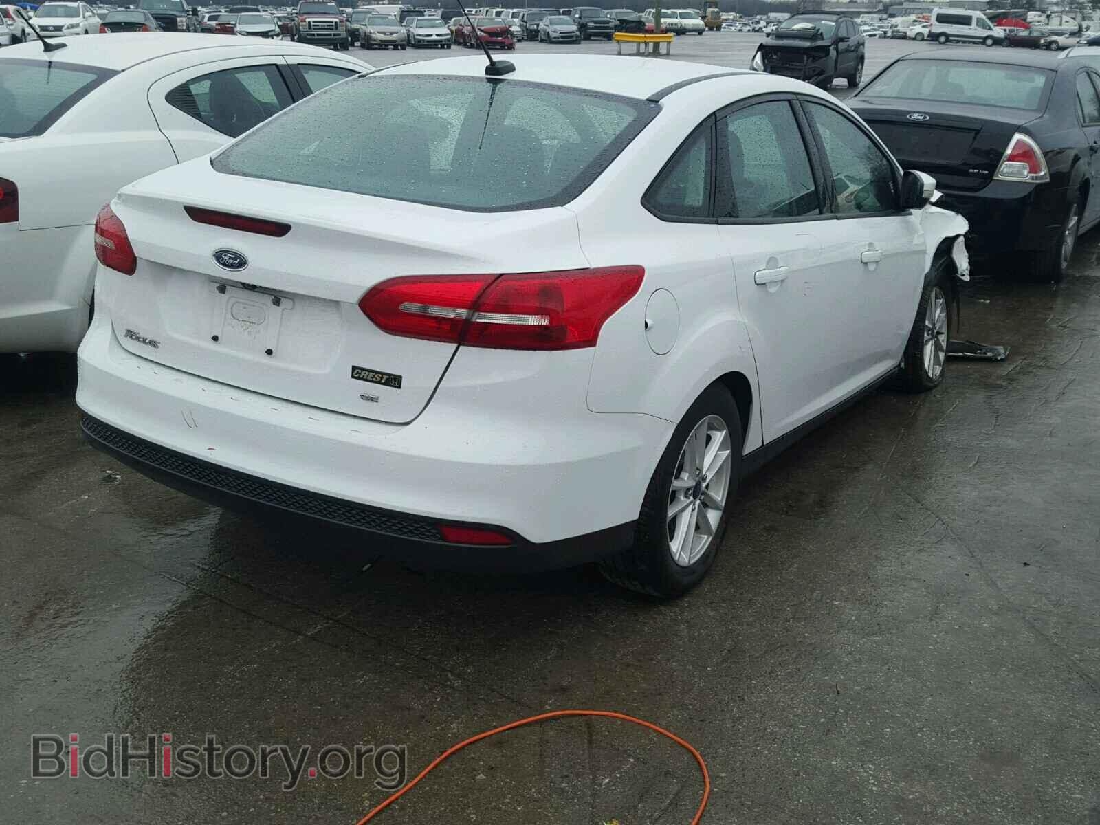 2015 FORD FOCUS - VIN: 1FADP3F22FL201421 - Photo 4