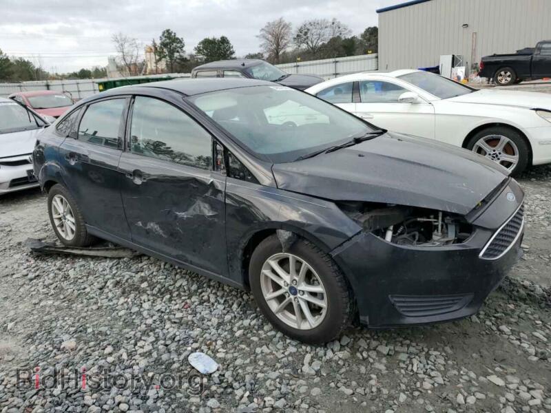 2015 Ford FOCUS (VIN 1FADP3F28FL215615) — photo 4 of 12