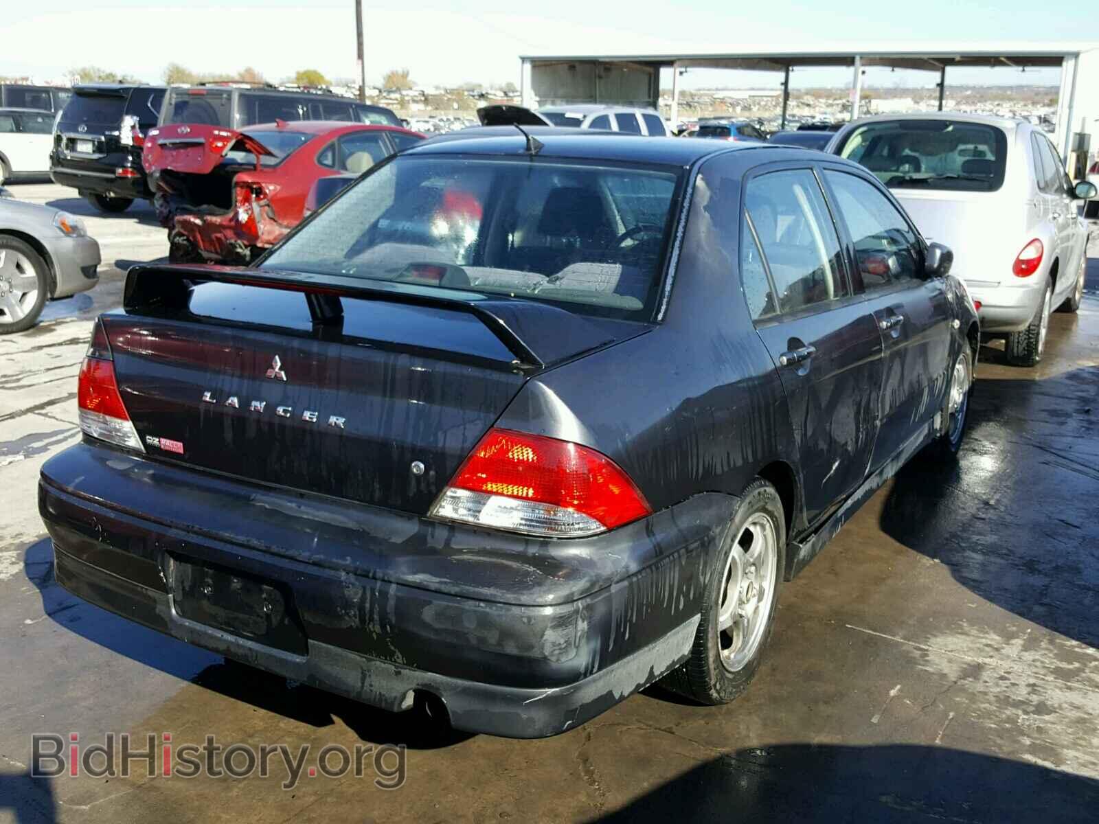 2002 MITSUBISHI LANCER - VIN: JA3AJ86E52U078285 - Photo 4