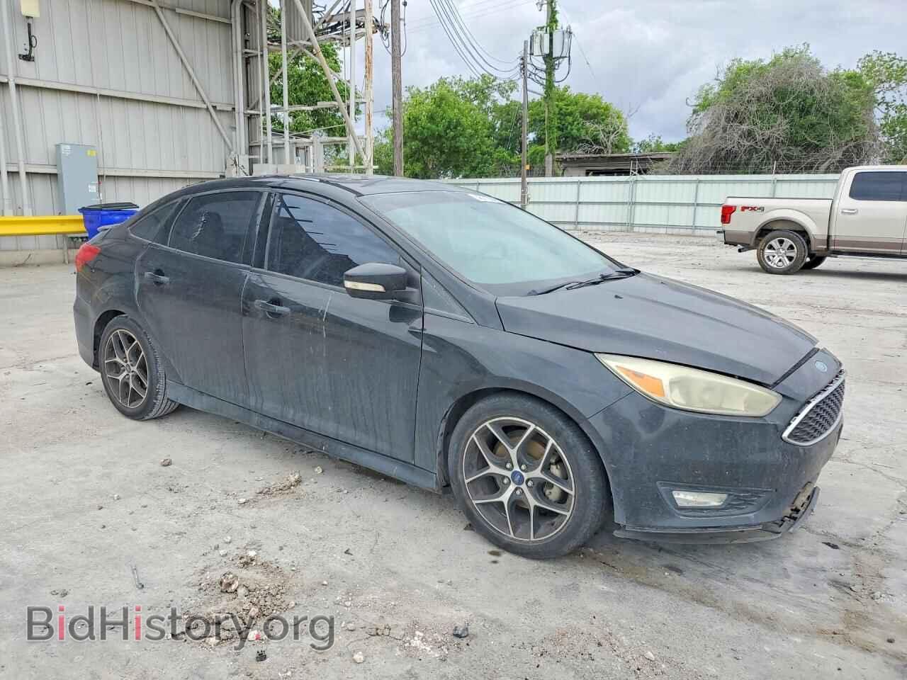 2015 FORD FOCUS - VIN: 1FADP3F21FL230716 - Photo 4
