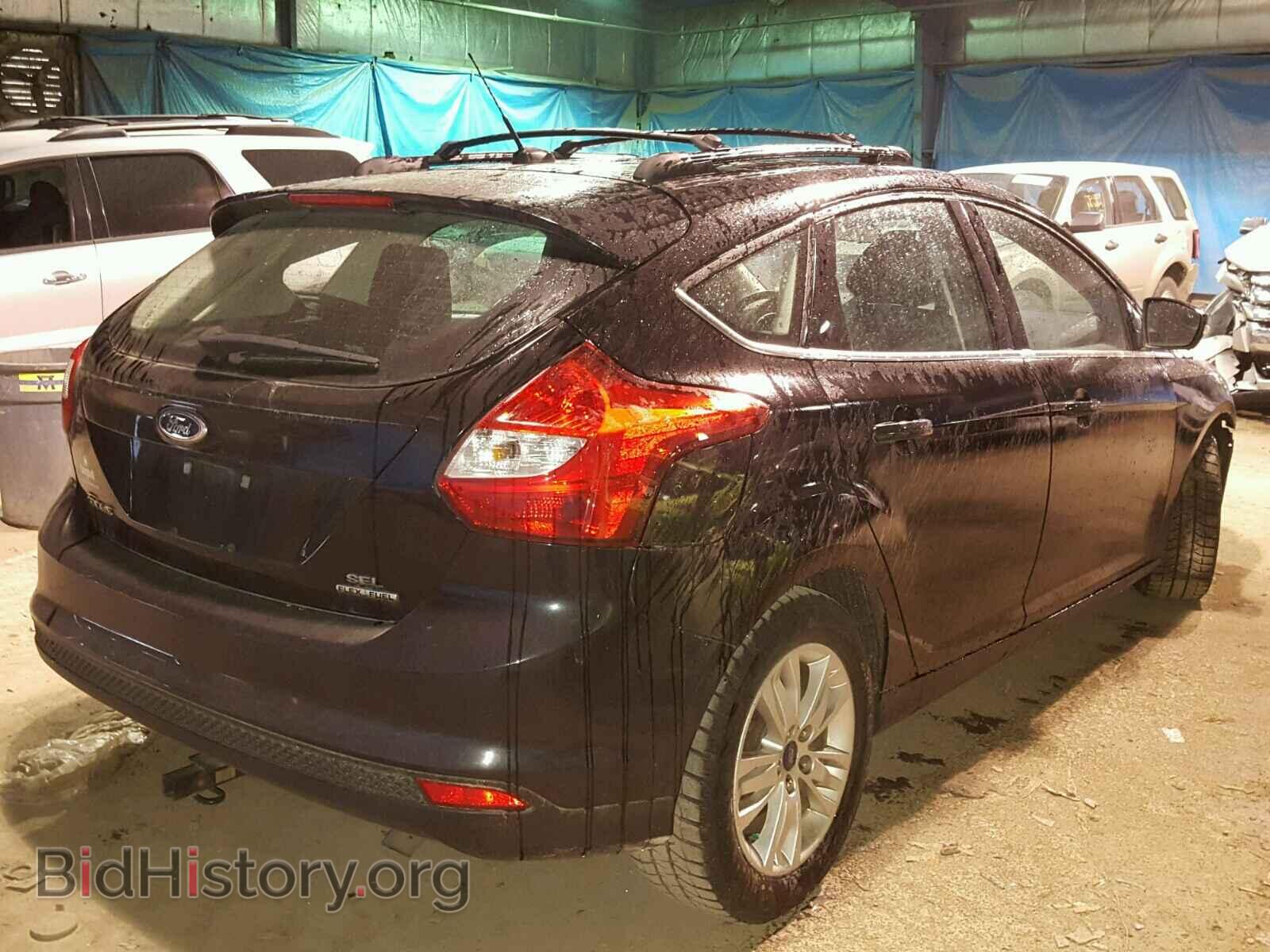2012 Ford FOCUS (VIN 1FAHP3M2XCL465700) — photo 4 of 10