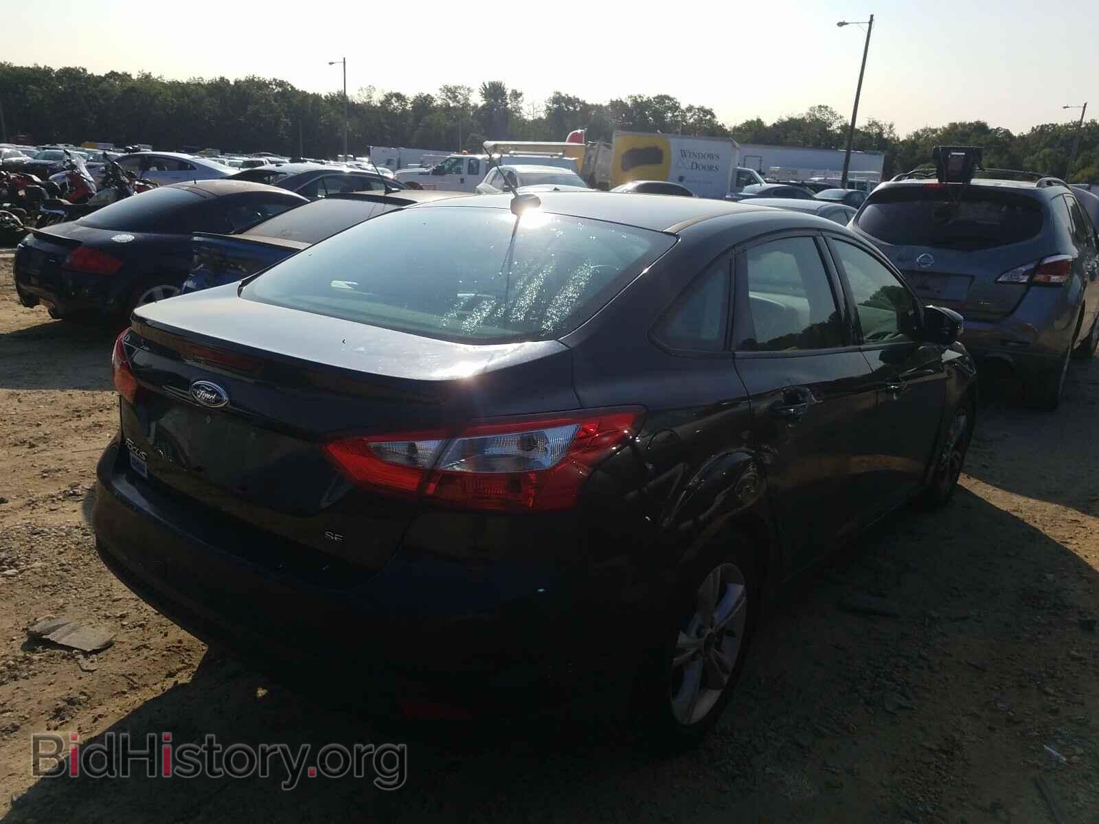 2014 FORD FOCUS - VIN: 1FADP3F25EL437138 - Photo 4