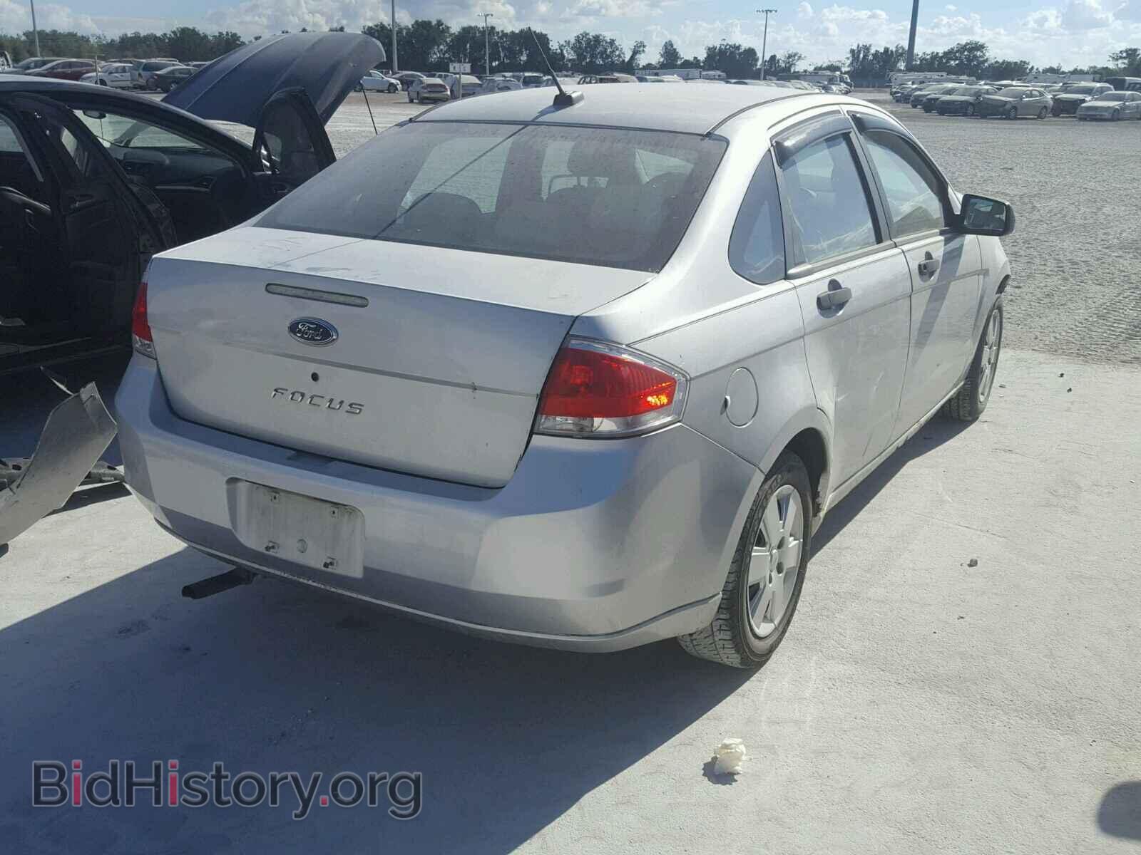 2009 FORD FOCUS - VIN: 1FAHP34N99W123897 - Photo 4