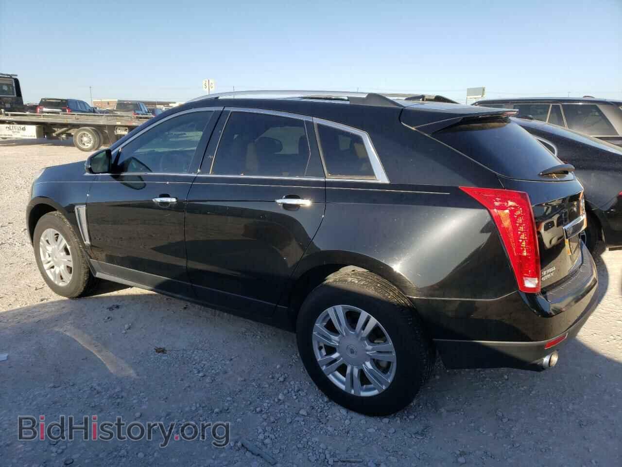 2014 CADILLAC SRX - VIN: 3GYFNBE35ES565879 - Фото 2