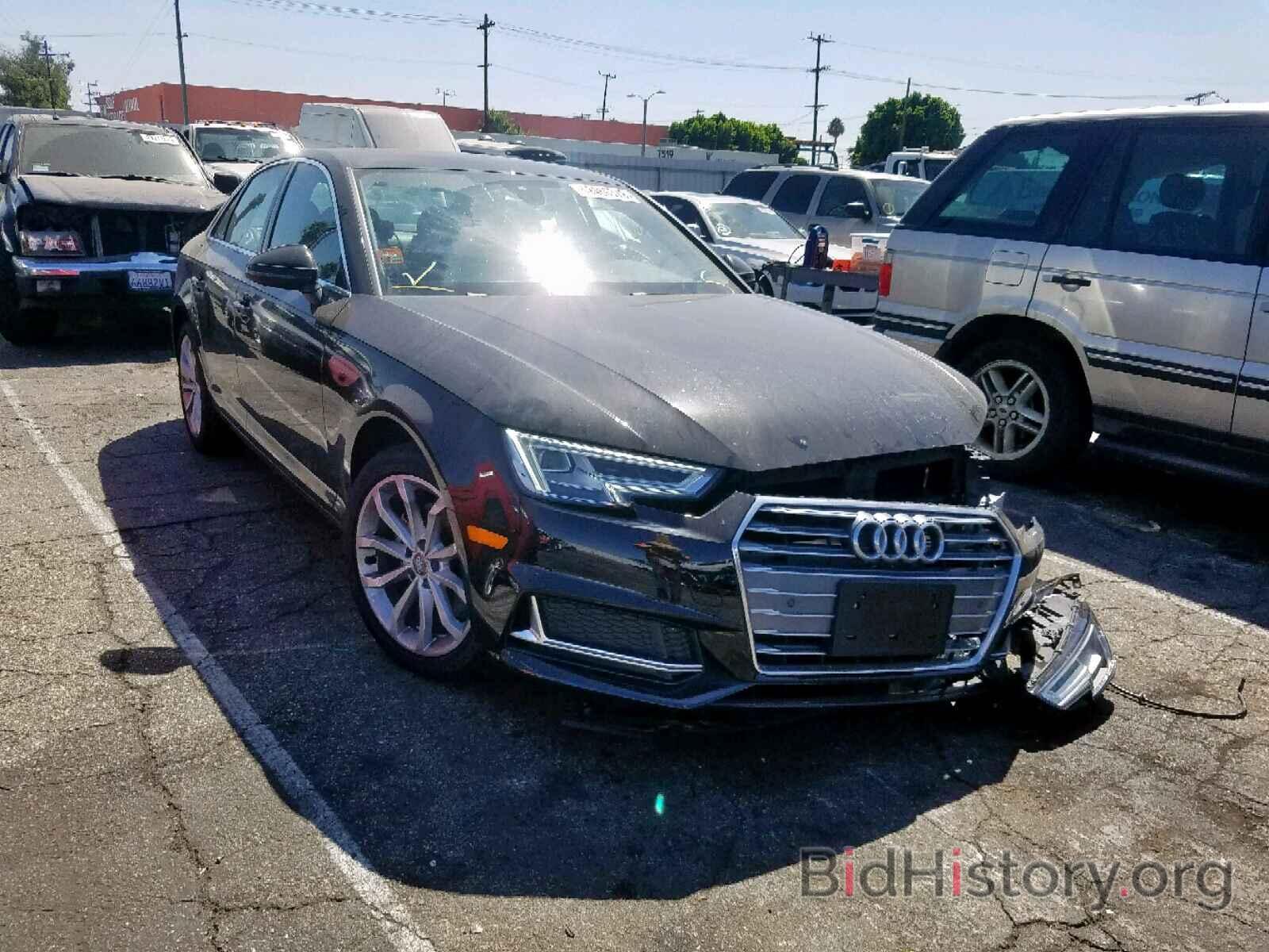 Photo WAUHMAF43KA039554 - AUDI A4 2019