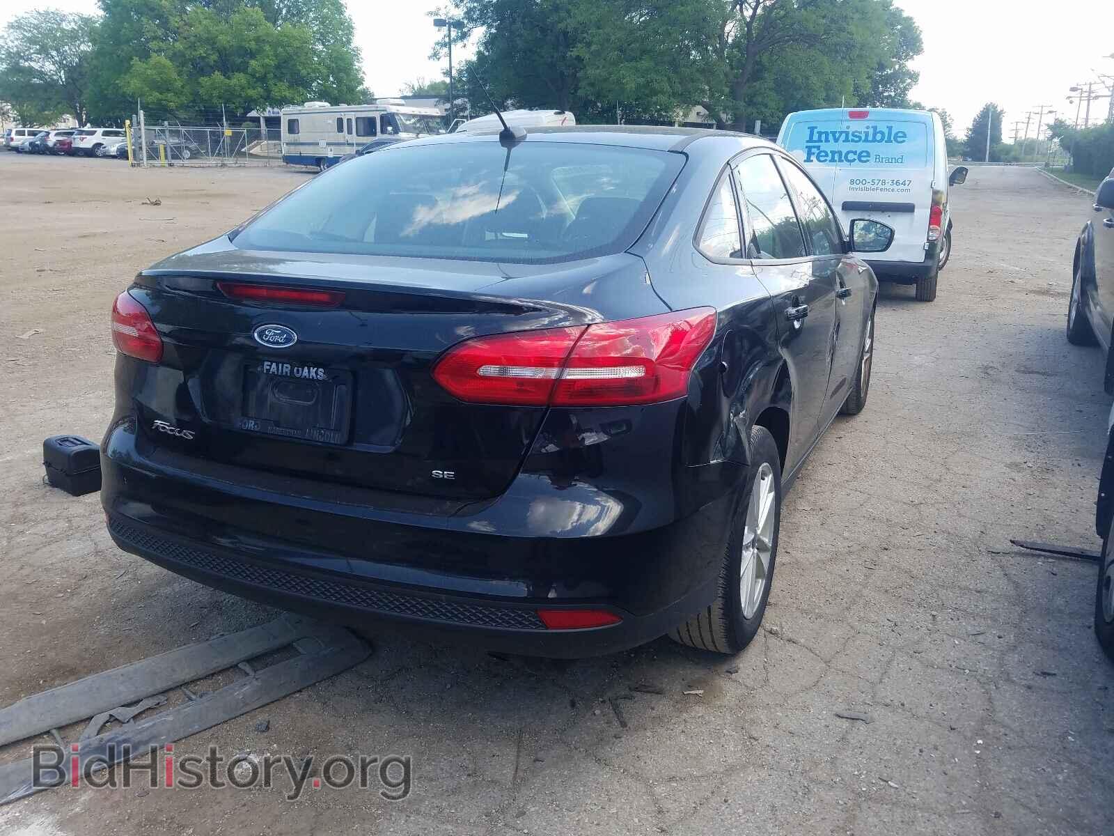 2017 FORD FOCUS - VIN: 1FADP3F21HL323433 - Photo 4