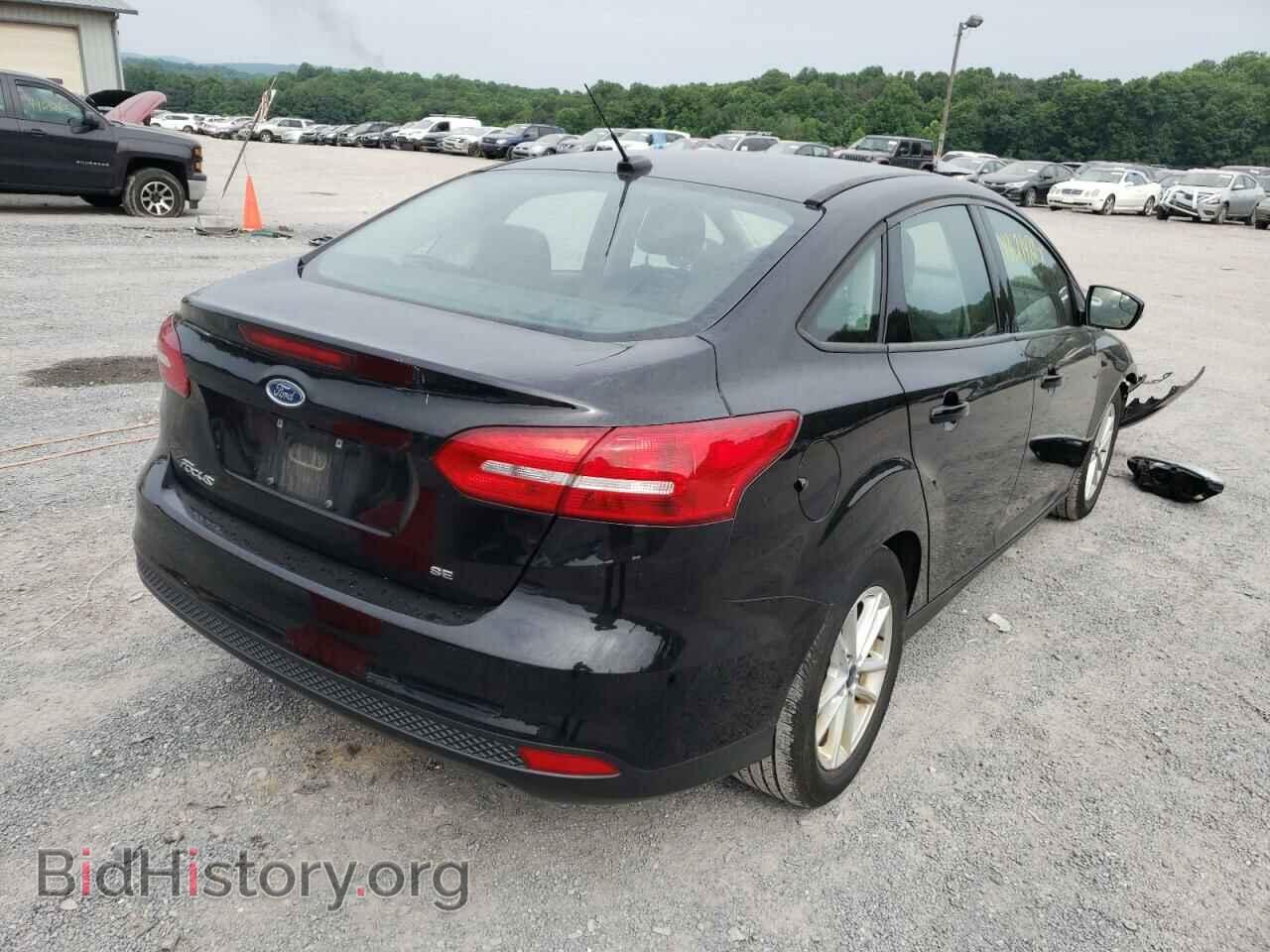2017 FORD FOCUS - VIN: 1FADP3F2XHL328033 - Фото 4