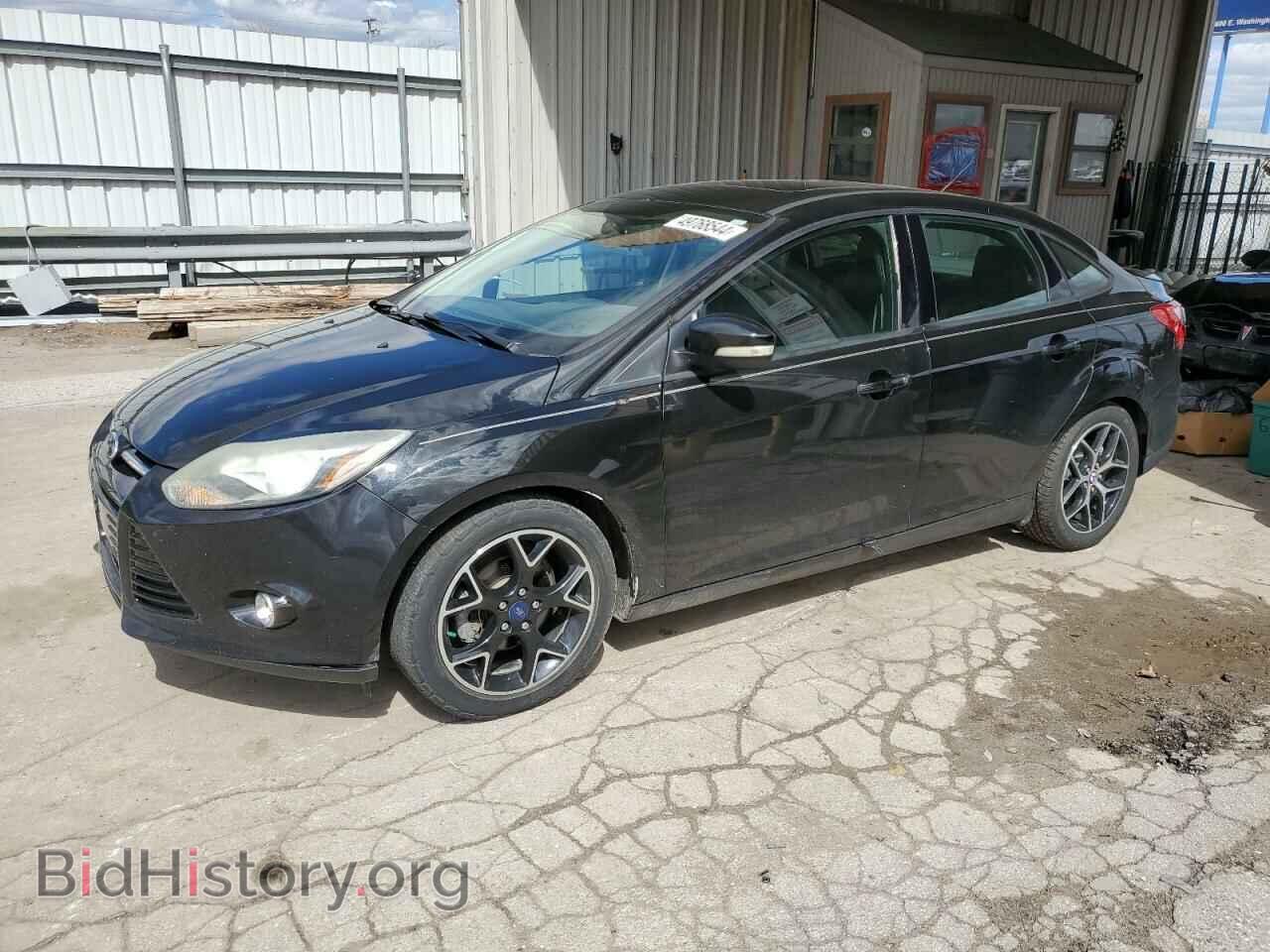 Фотография 1FADP3F26EL457348 - FORD FOCUS 2014