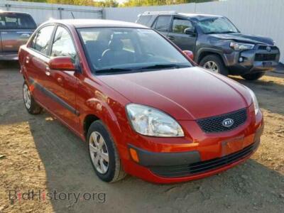 2009 Kia RIO BASE, красный — VIN KNADE223496526161, Copart