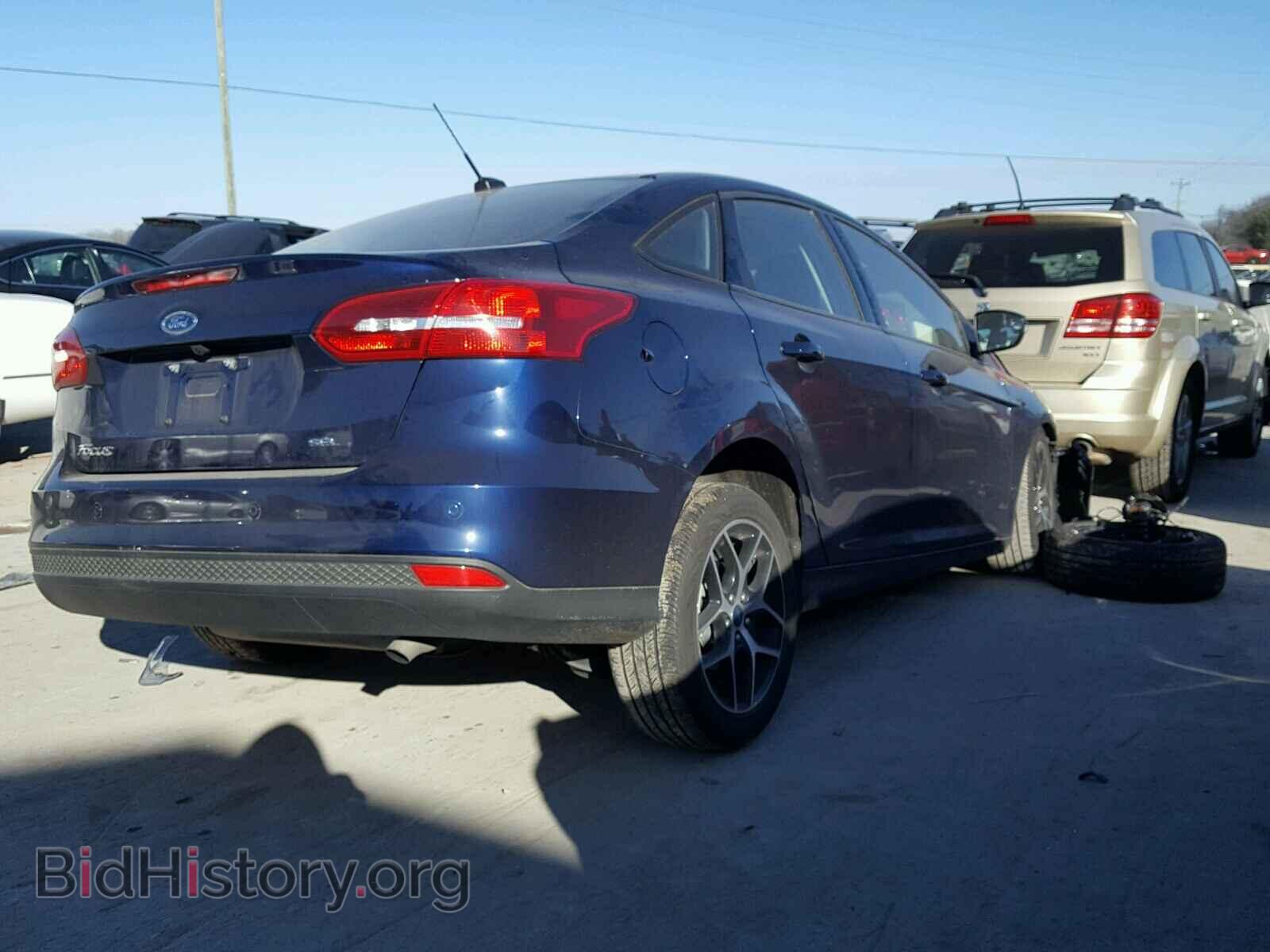 2017 FORD FOCUS - VIN: 1FADP3H28HL301877 - Фото 4