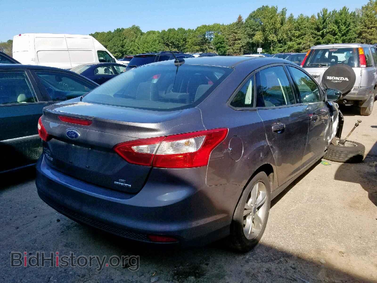 2014 FORD FOCUS - VIN: 1FADP3F2XEL323071 - Photo 4