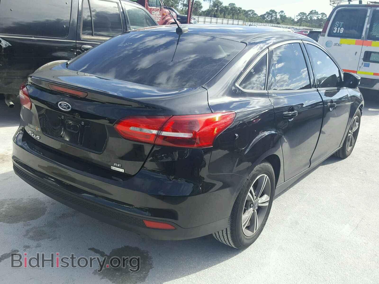 2017 FORD FOCUS - VIN: 1FADP3FE1HL275202 - Photo 4