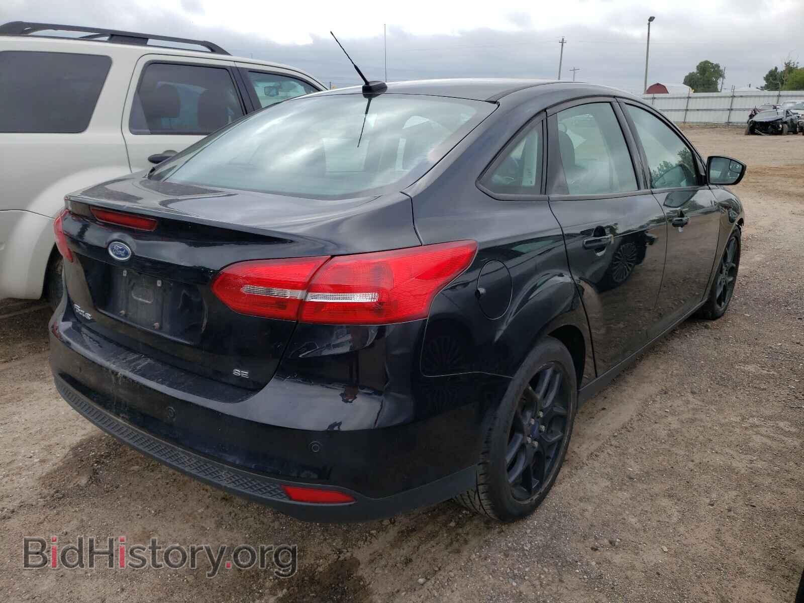 2016 FORD FOCUS - VIN: 1FADP3F24GL216102 - Photo 4