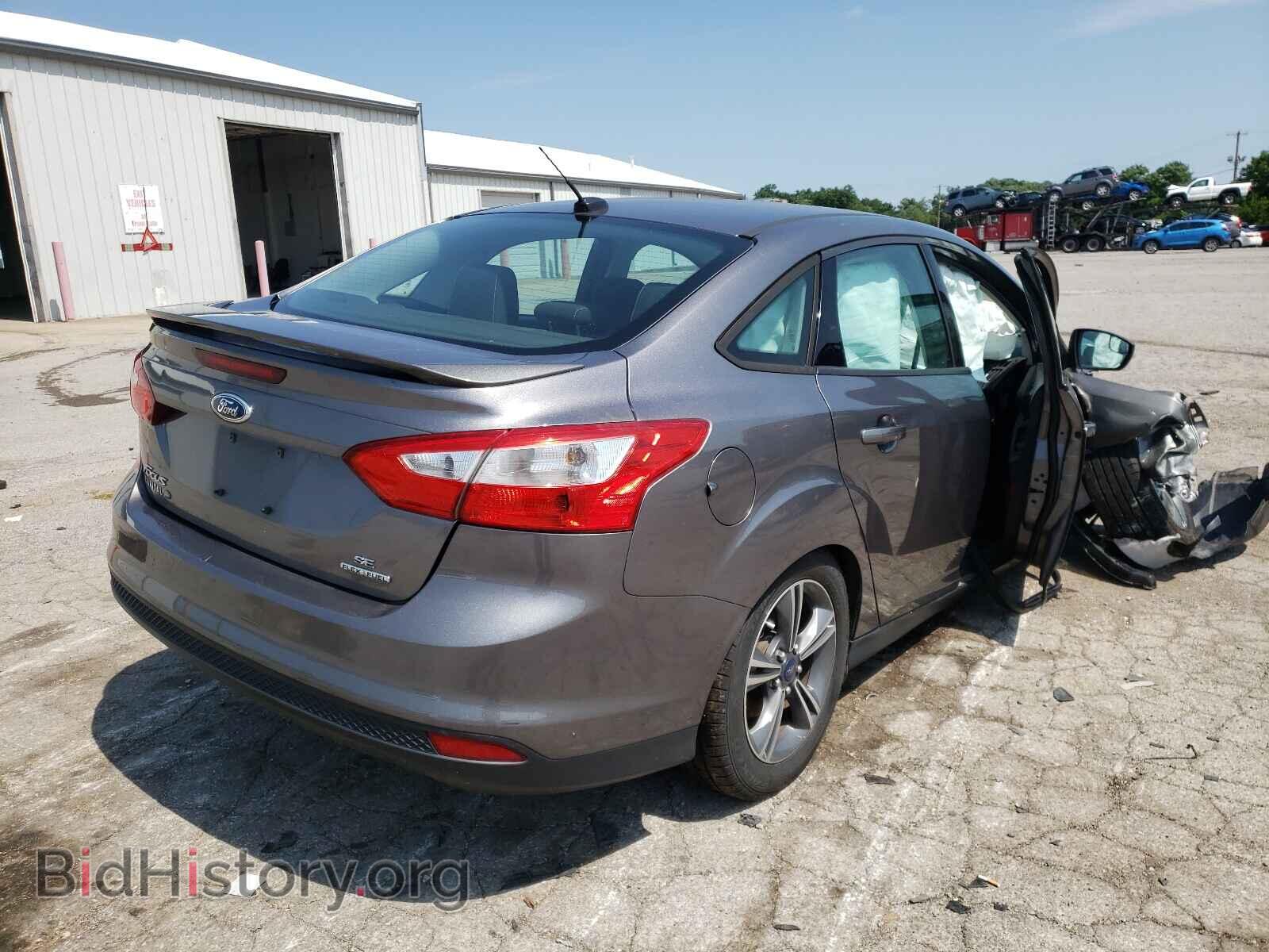 2014 FORD FOCUS - VIN: 1FADP3F28EL179794 - Photo 4