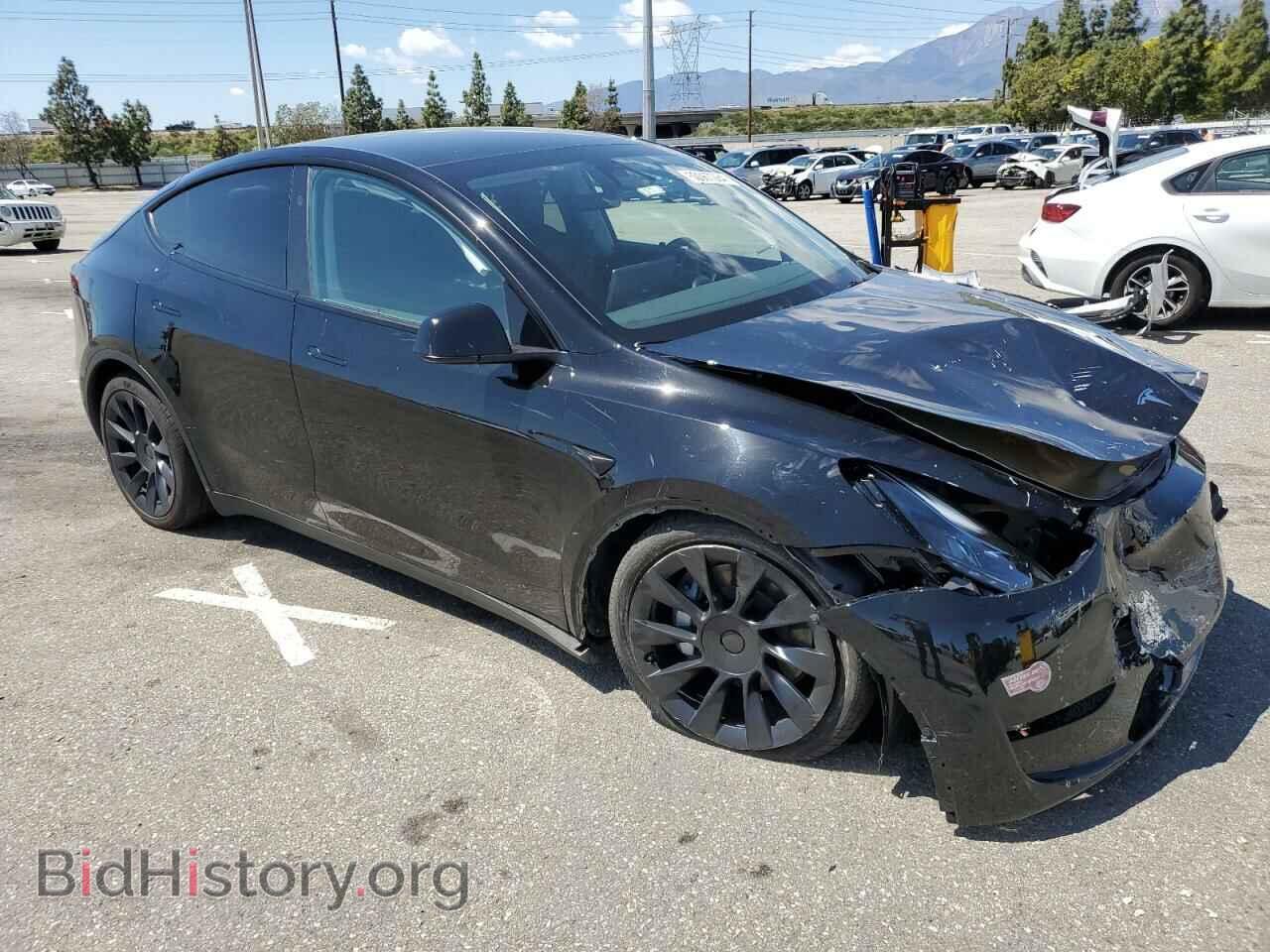 2023 TESLA MODEL Y - VIN: 7SAYGDEE5PF889208 - Photo 4