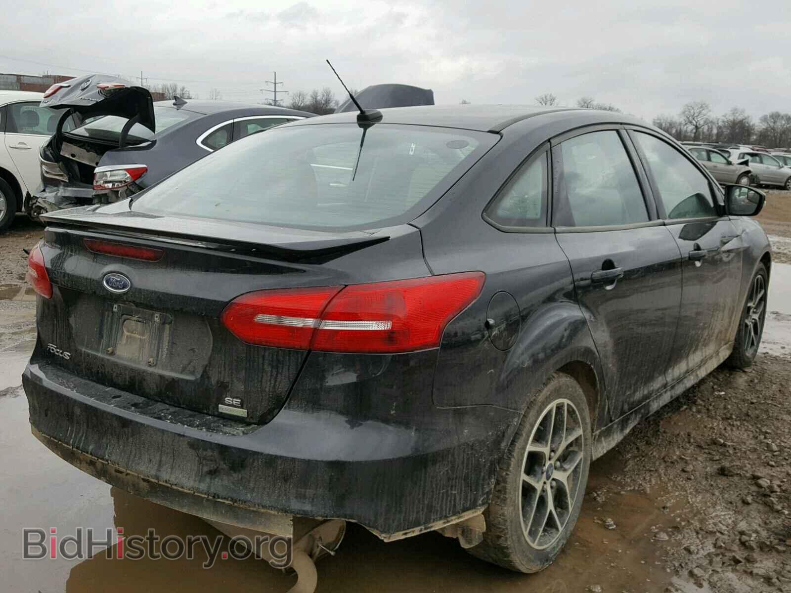 2015 FORD FOCUS - VIN: 1FADP3FE9FL217142 - Photo 4