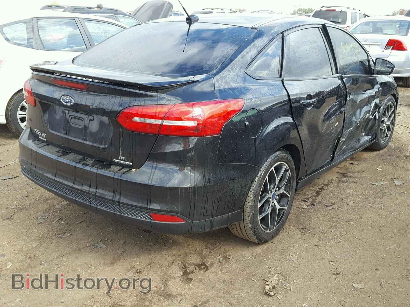 2015 FORD FOCUS - VIN: 1FADP3F2XFL385524 - Photo 4