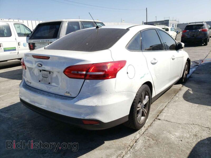 2017 Ford FOCUS (VIN 1FADP3FE6HL308369) — photo 4 of 10