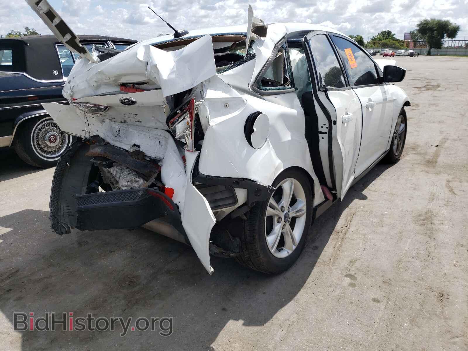 2014 FORD FOCUS - VIN: 1FADP3F26EL301990 - Photo 4