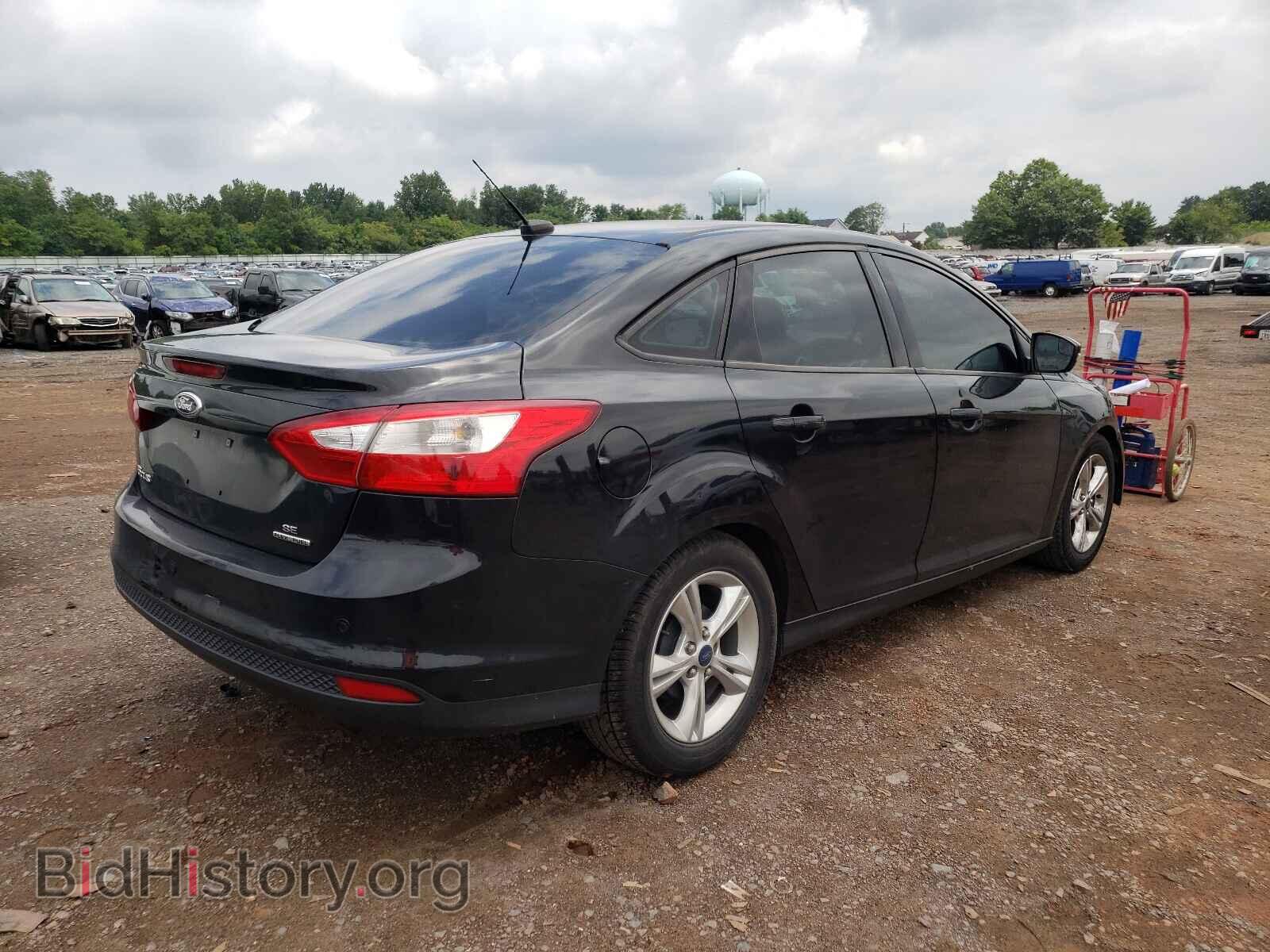 2014 FORD FOCUS - VIN: 1FADP3F21EL106962 - Photo 4