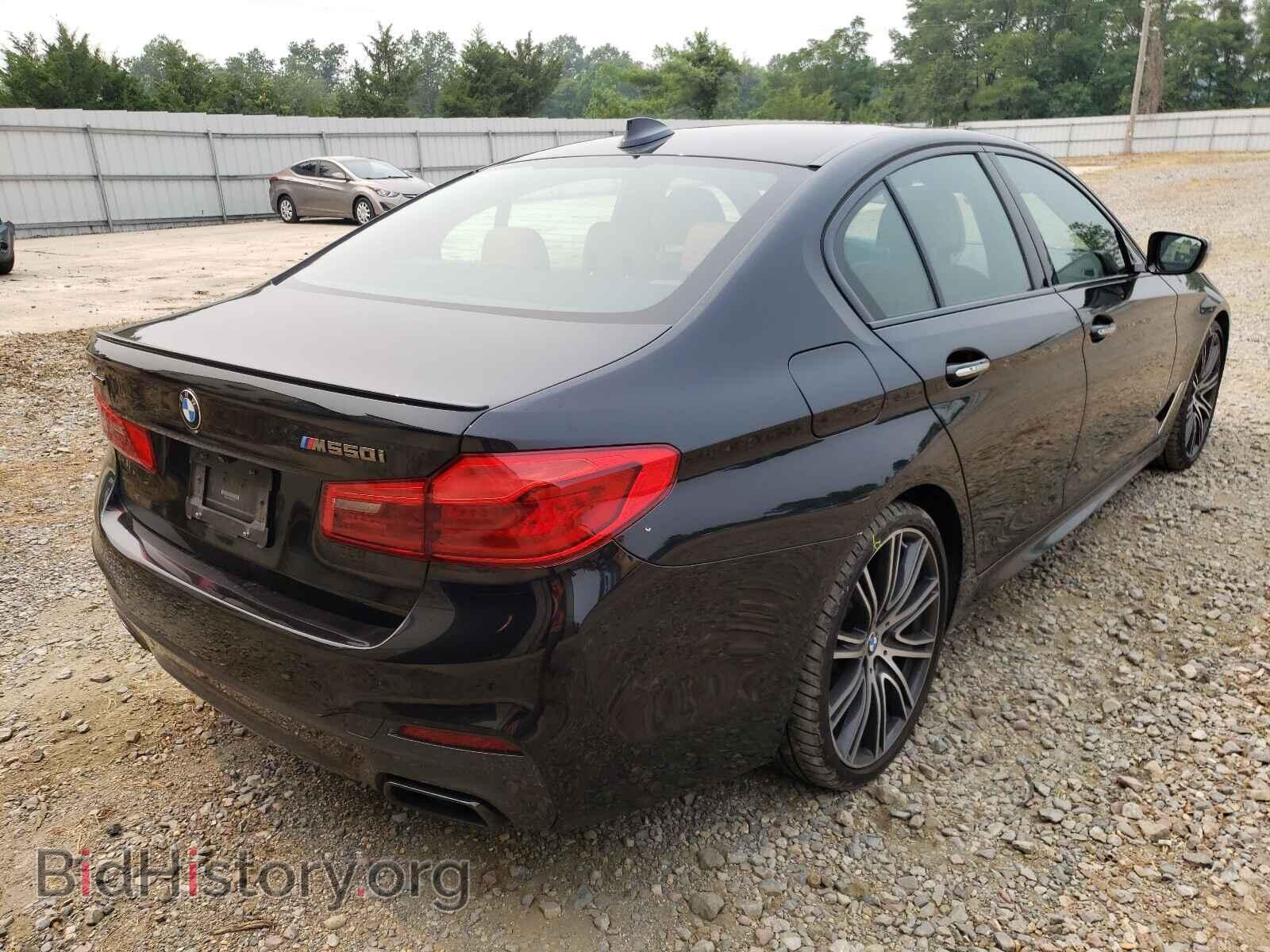 2018 BMW M5 - VIN: WBAJB9C53JB036469 - Фото 4
