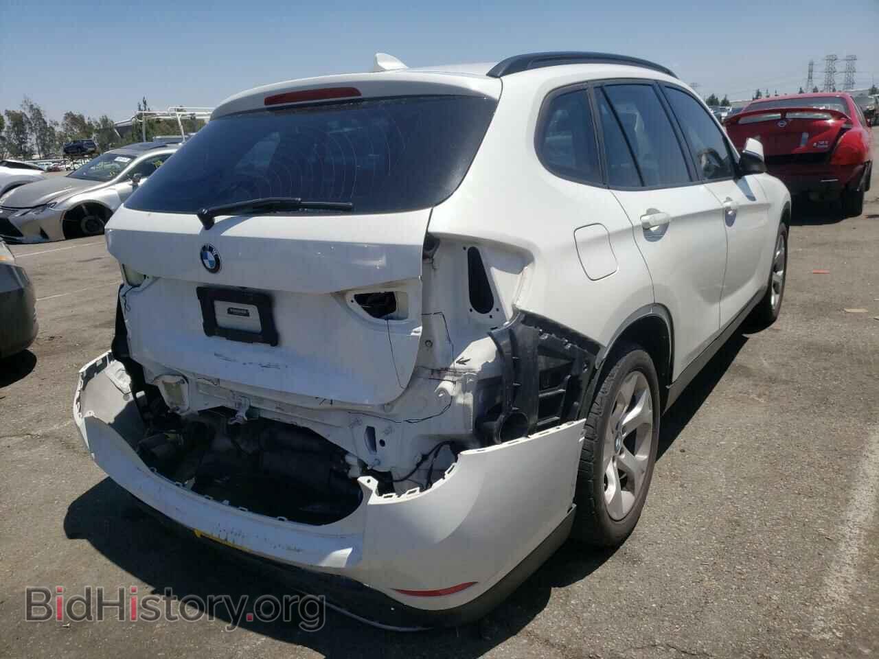 2014 BMW X1 - VIN: WBAVM1C55EVW54863 - Фото 4