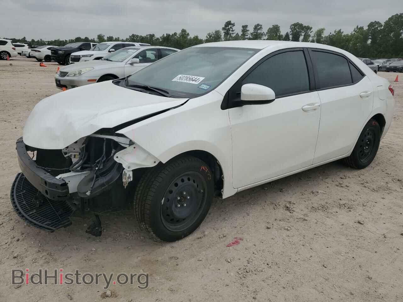 Фотография 5YFBURHEXEP162748 - TOYOTA COROLLA 2014
