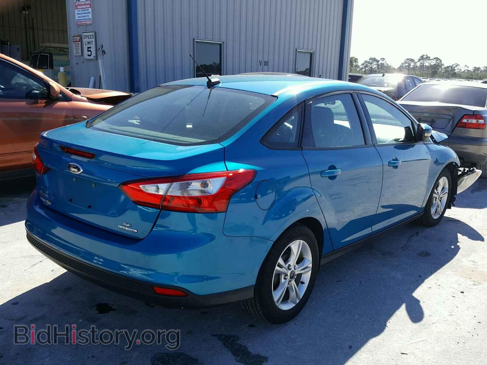 2014 FORD FOCUS - VIN: 1FADP3F21EL121722 - Photo 4