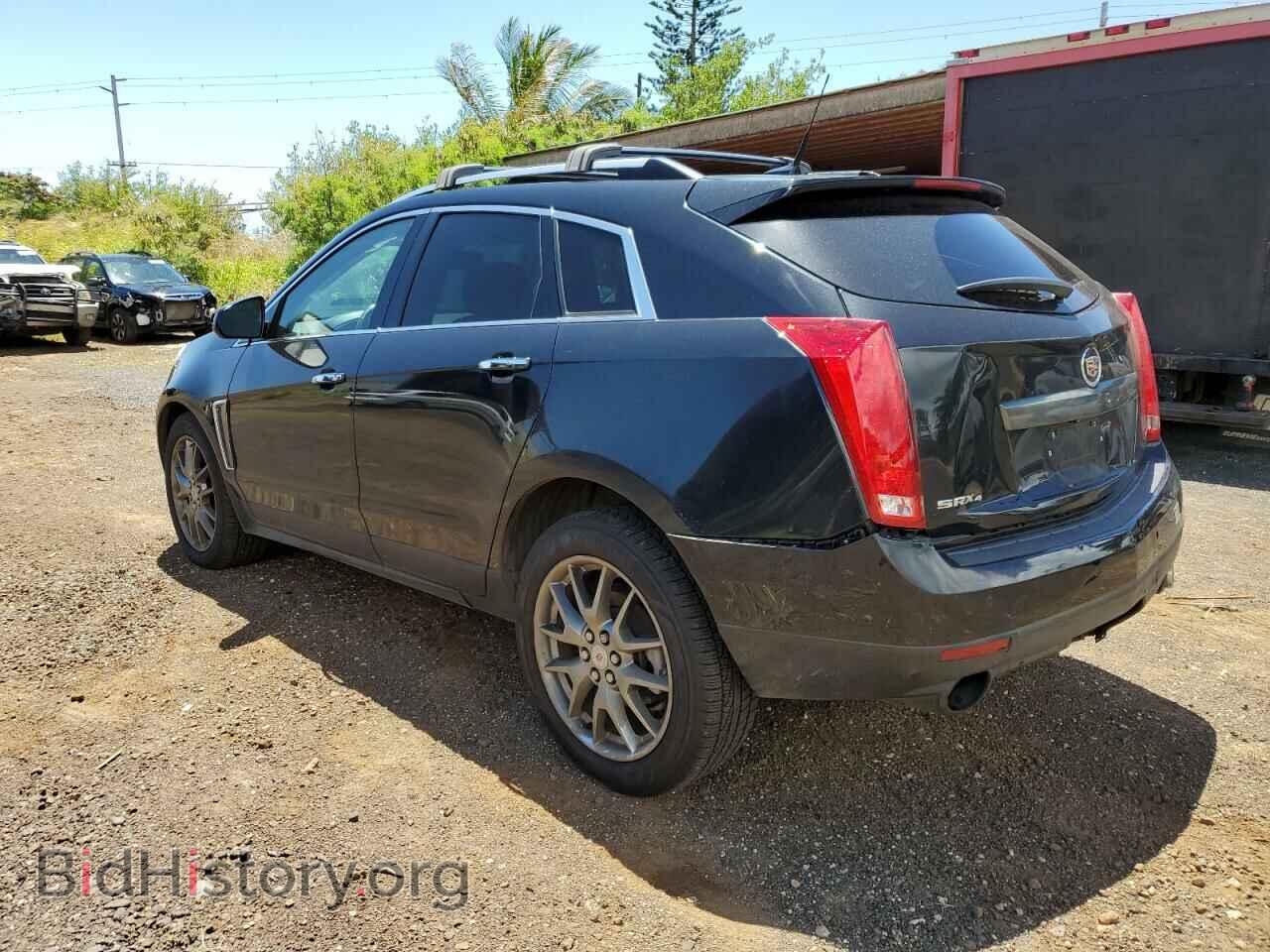 2014 CADILLAC SRX - VIN: 3GYFNFE35ES523056 - Фото 2