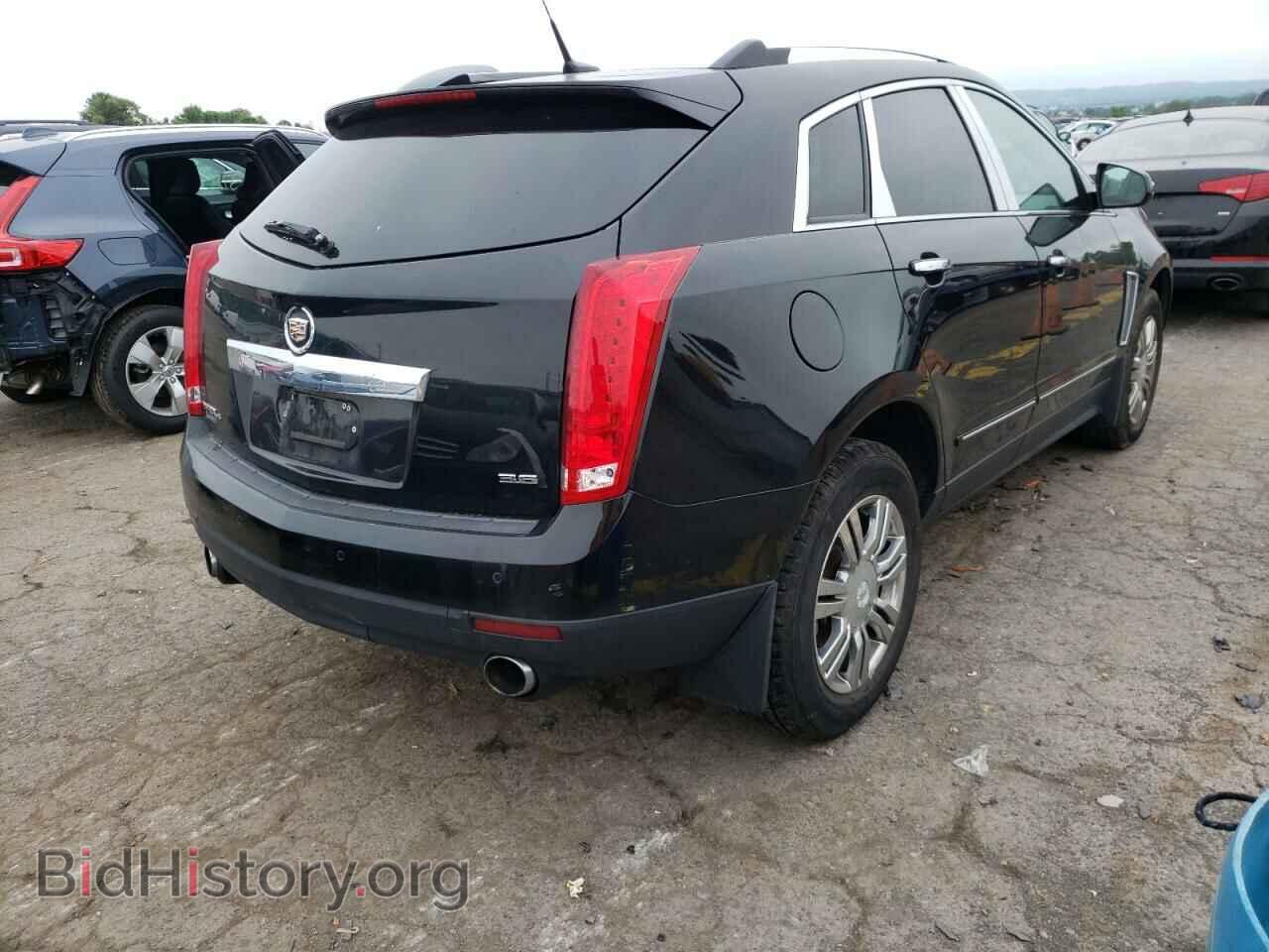 2013 CADILLAC SRX - VIN: 3GYFNGE34DS522100 - Фото 4