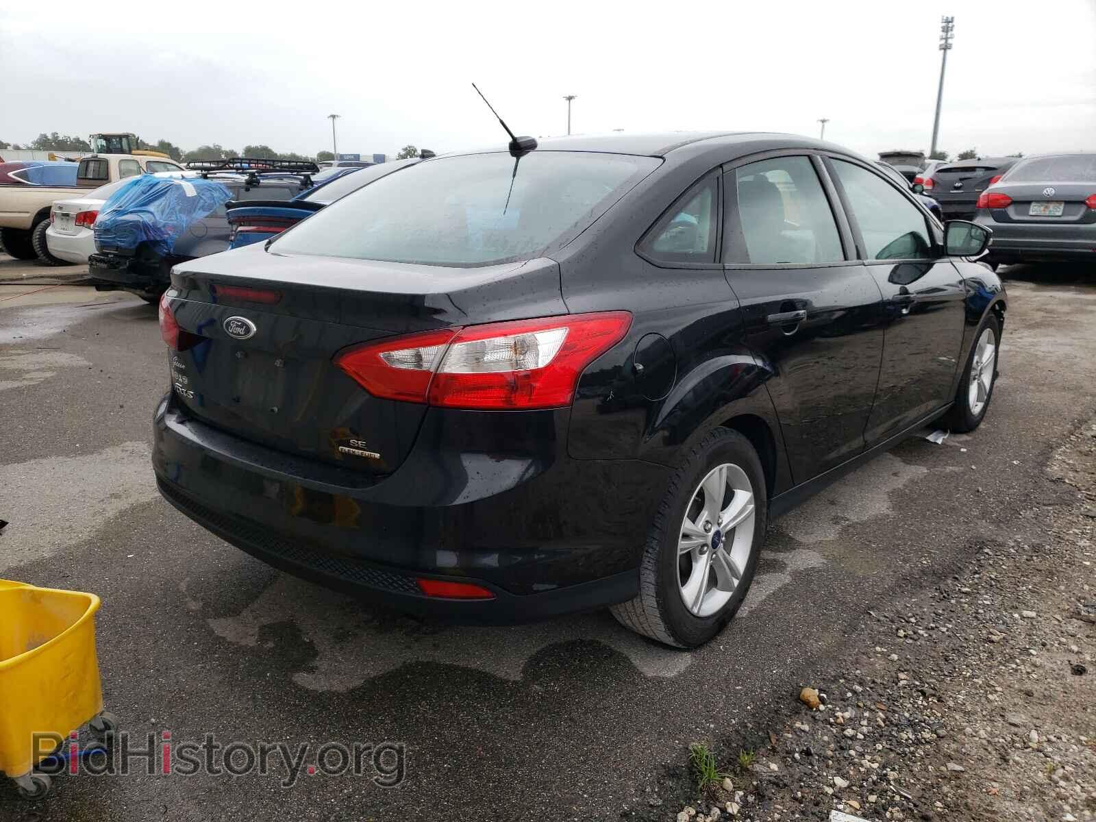 2014 FORD FOCUS - VIN: 1FADP3F26EL397040 - Photo 4