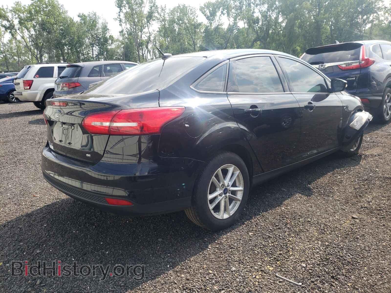 2016 FORD FOCUS - VIN: 1FADP3F25GL303913 - Photo 4