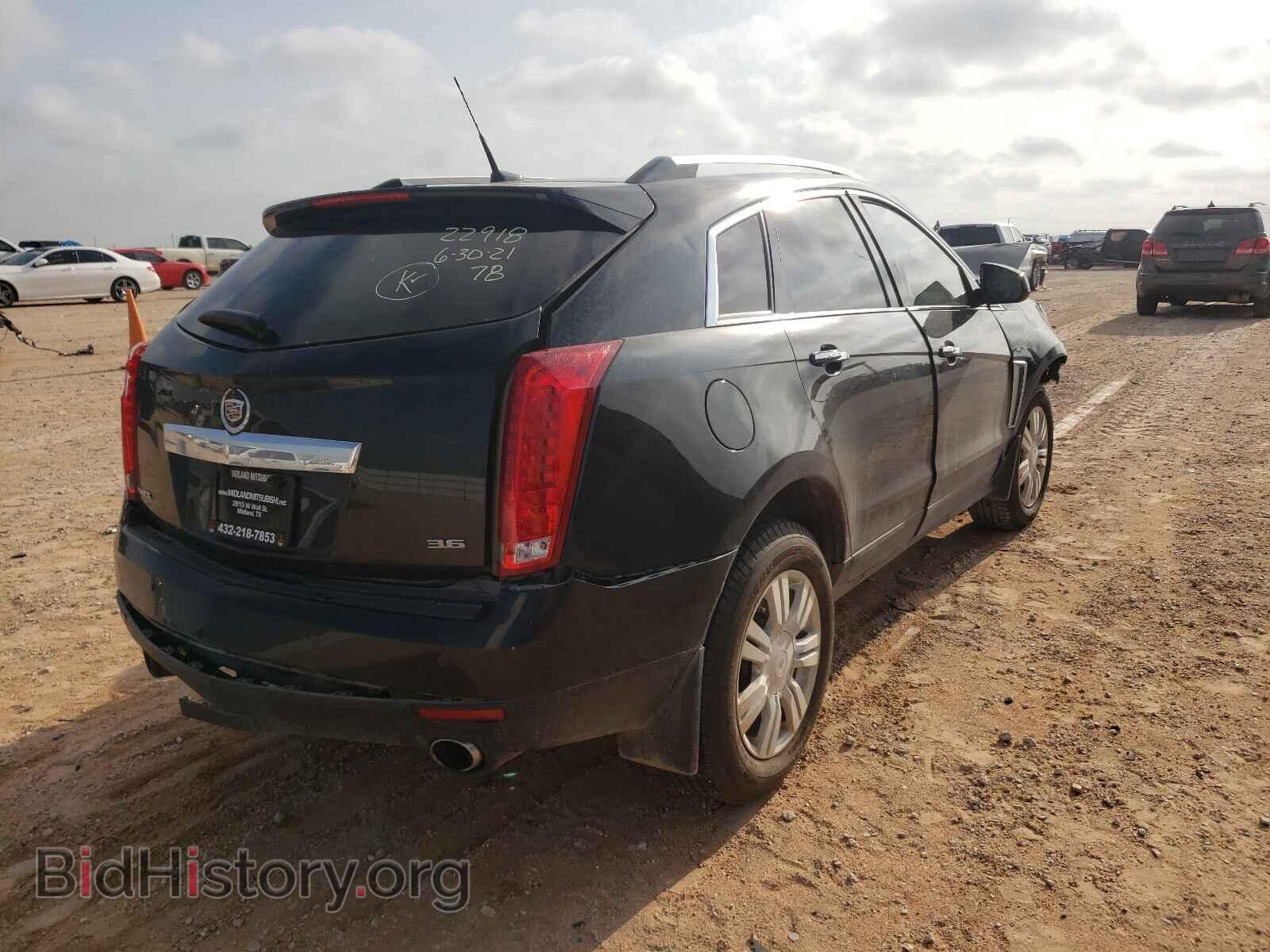 2014 CADILLAC SRX - VIN: 3GYFNBE36ES521907 - Фото 4