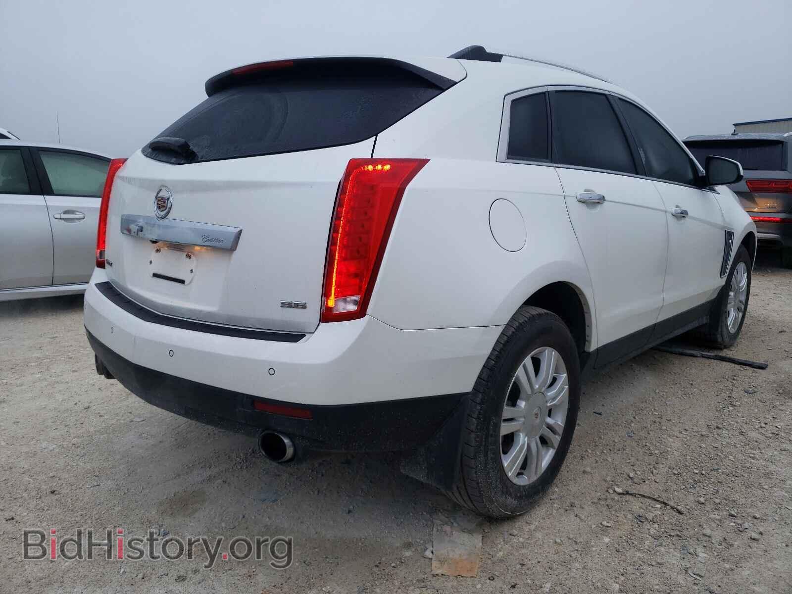 2015 CADILLAC SRX - VIN: 3GYFNBE39FS525435 - Фото 4