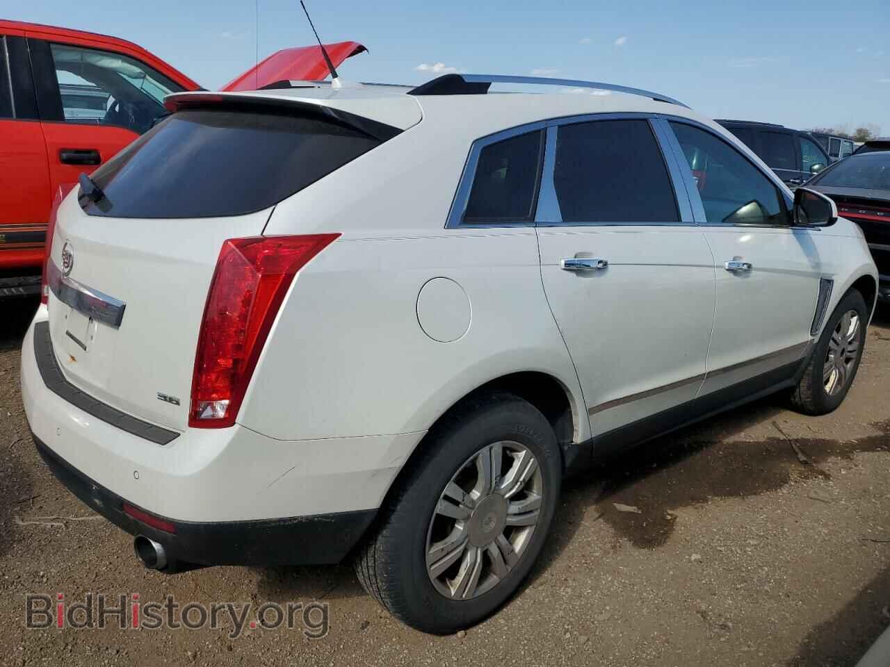 2014 CADILLAC SRX - VIN: 3GYFNEE33ES629063 - Фото 3