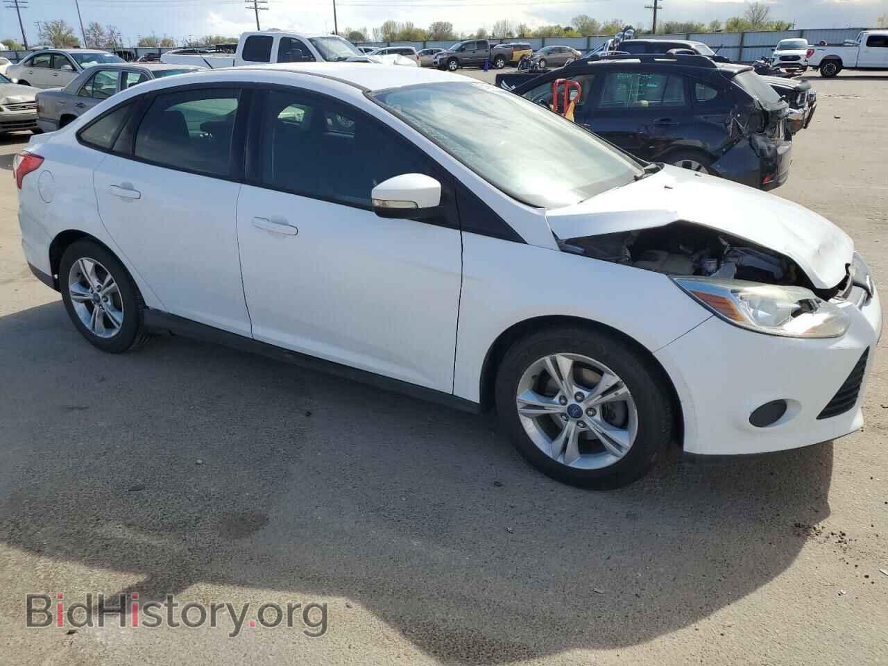 2014 FORD FOCUS - VIN: 1FADP3F28EL349829 - Photo 4
