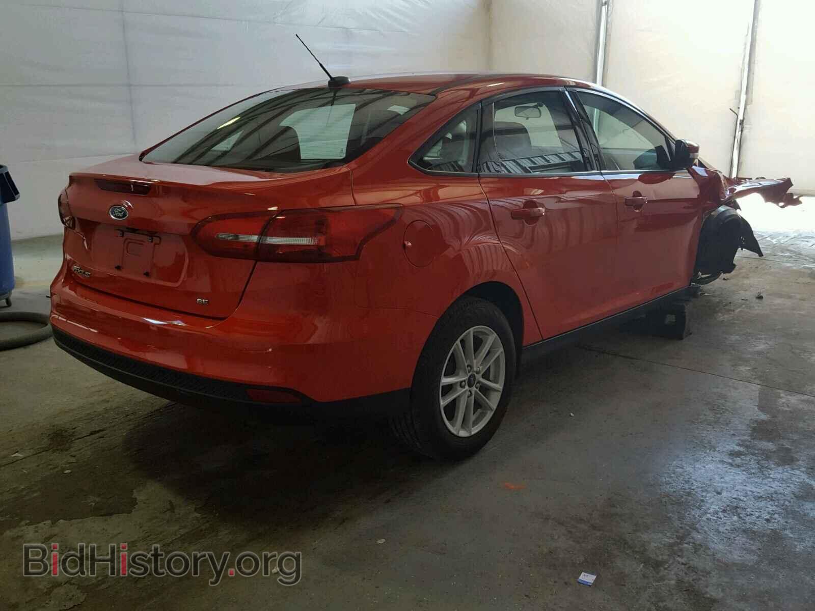 2017 FORD FOCUS - VIN: 1FADP3F21HL281703 - Photo 4