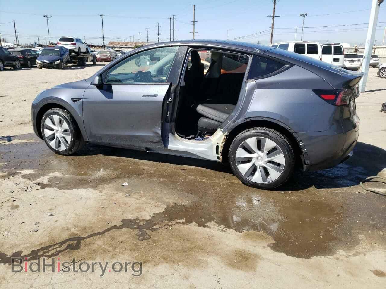 2023 TESLA MODEL Y - VIN: 7SAYGDEEXPA201121 - Фото 2