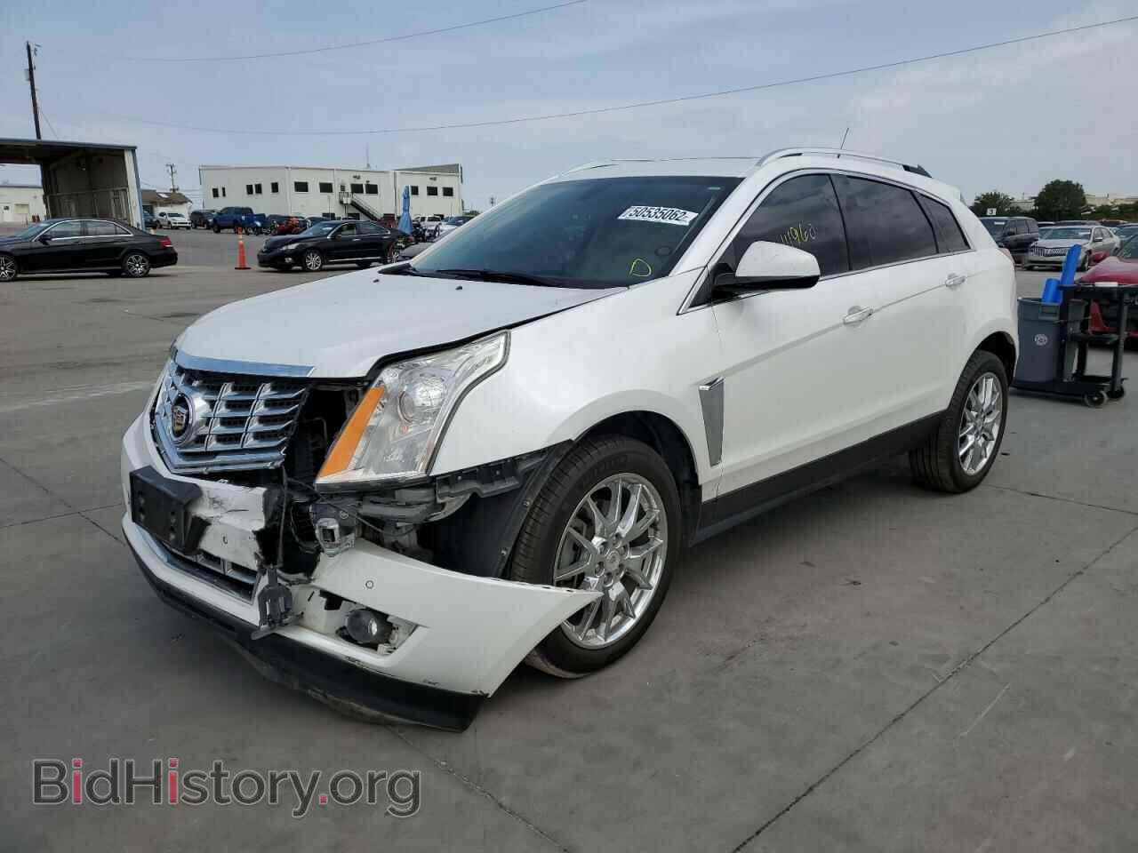 2014 CADILLAC SRX - VIN: 3GYFNCE35ES645463 - Фото 2
