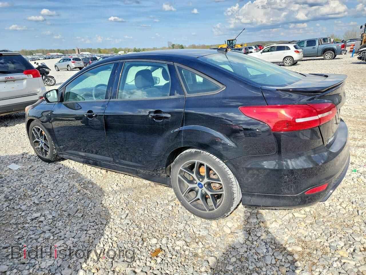 2016 FORD FOCUS - VIN: 1FADP3F29GL385371 - Фото 2