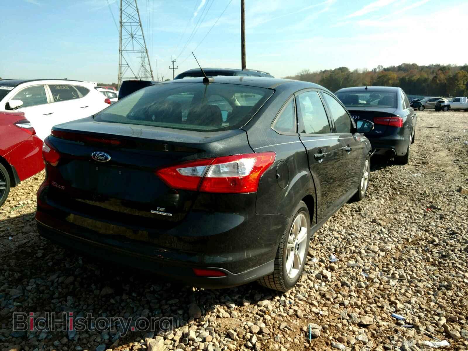 2014 FORD FOCUS - VIN: 1FADP3F2XEL217638 - Photo 4