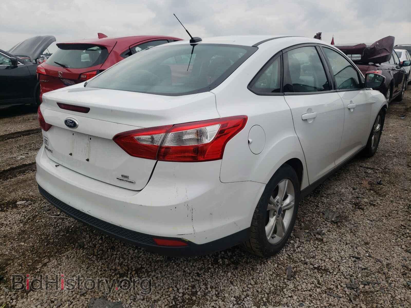 2014 FORD FOCUS - VIN: 1FADP3F22EL304935 - Photo 4