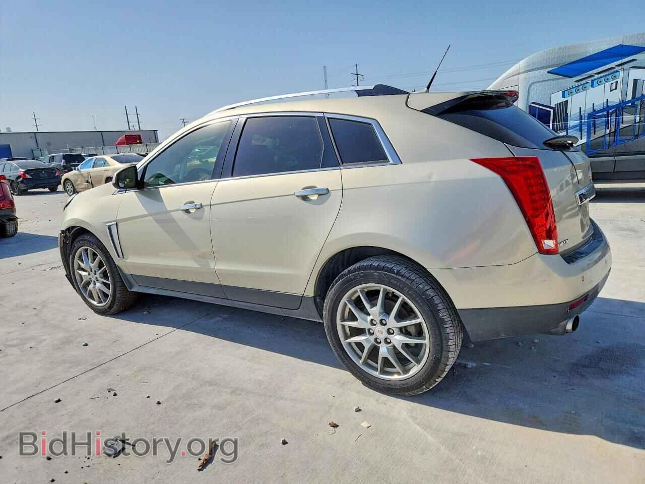 2014 CADILLAC SRX - VIN: 3GYFNDE33ES663918 - Фото 2