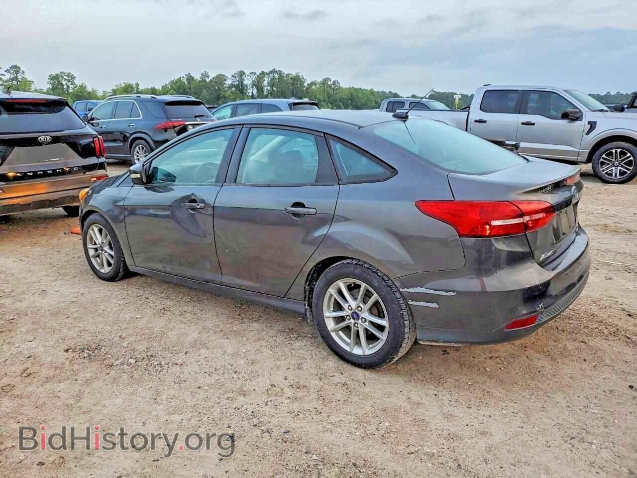 2015 FORD FOCUS - VIN: 1FADP3F29FL323810 - Фото 2