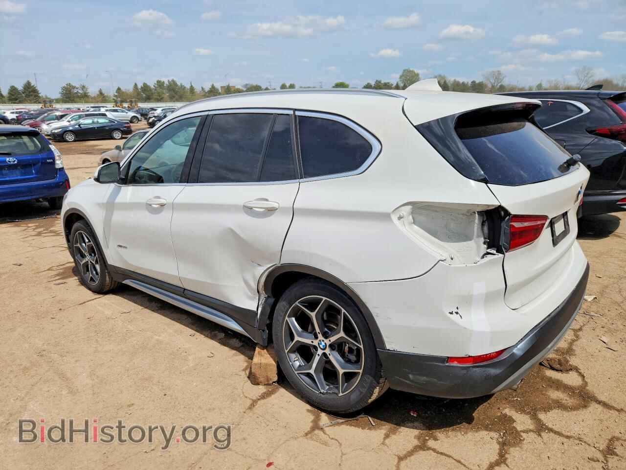 2017 BMW X1 - VIN: WBXHT3C34H5F70119 - Фото 2