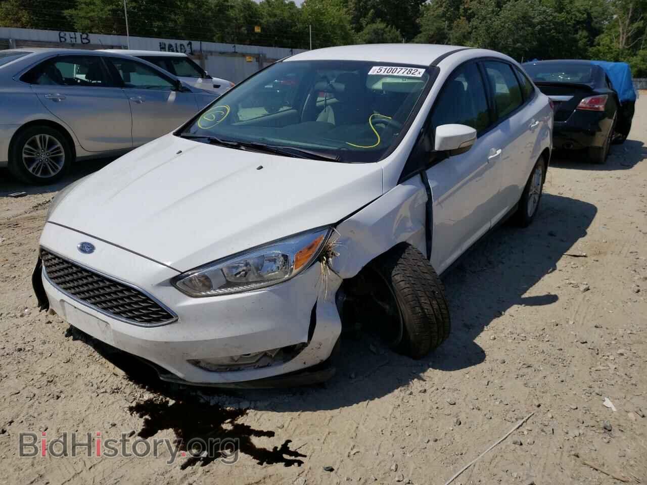 2016 FORD FOCUS - VIN: 1FADP3F21GL397644 - Фото 2