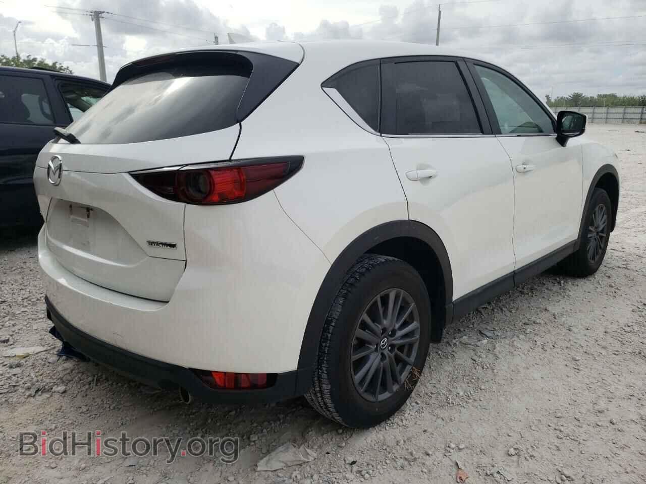 2021 MAZDA CX-5 - VIN: JM3KFACM0M1329977 - Фото 4